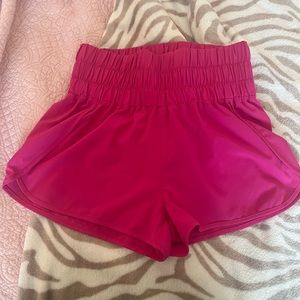 barley worn hot pink flowy work out shorts with elastic waist